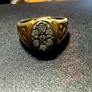 Men’s 14k yellow gold and 1/2 karat in 1/8karat individual diamonds.